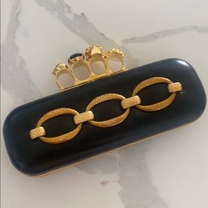 Alexander McQueen black and gold  knuckle bag